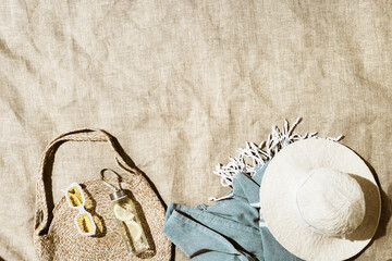 Beach relaxation concept, aesthetic flat lay fashion beach bag, trend stylish yellow sunglasses,...