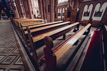 Rows of church benches at the old european catholic church.