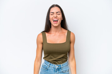 Obraz premium Young caucasian woman isolated on white background shouting to the front with mouth wide open