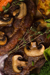 grilled vegetables with meat and mushrooms.