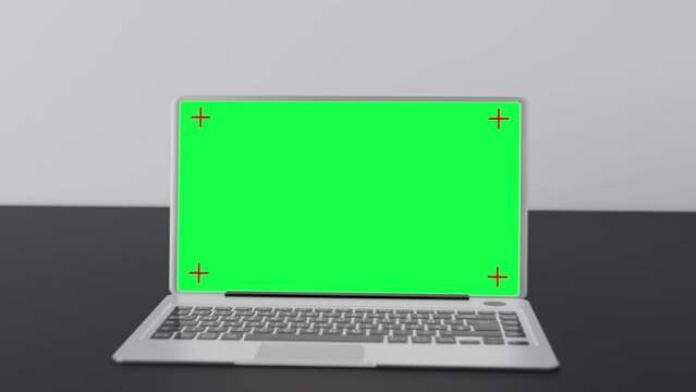Laptop with greenscreen. Chromakey. 4k, UHD.