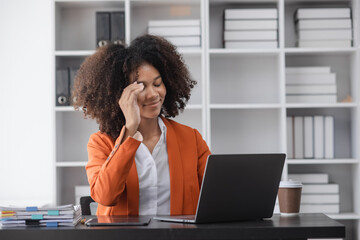 Obraz premium Unhappy confused millennial African American business woman, stuck with difficult task or feeling stressed working with documents, Depressed upset.