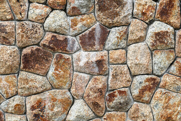 A stone brick wall is a structure constructed by arranging and cementing together individual pieces...