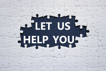 Let us help you symbol. White puzzle with words Let us help you. Beautiful black background. Business and Let us help you concept. Copy space.