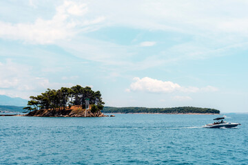 Fototapeta premium Small rocky island on the Rajska beach on the Rab island in Croatia