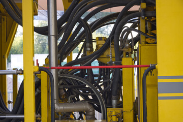 Hydraulic lines with black plastic tape Antistatic for explosive environments on Railway maintenance train.