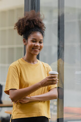 Happy smiling young African American businesswoman.