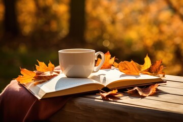 Naklejka na ściany i meble Cup of black tea with books and autumn leaves , AI Generated