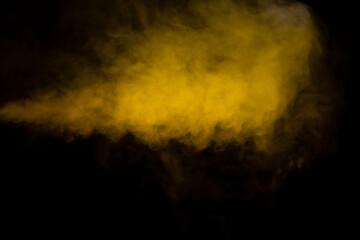 Yellow steam on a black background.