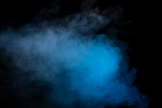 Blue and yellow steam on a black background.