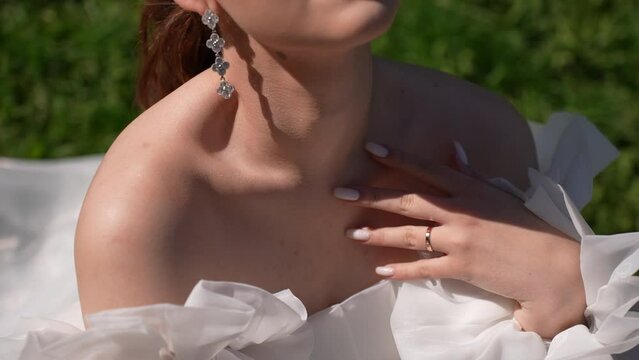 Close-up of the naked shoulders of the bride