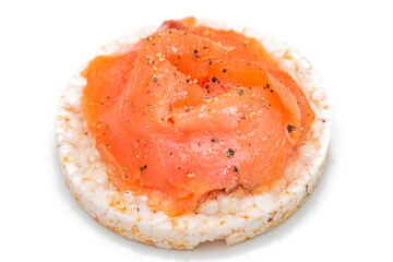 Tasty Rice Cake Sandwich with Fresh Salmon Slices Isolated on White. Easy Breakfast and Diet Food. Crispbread with Red Fish. Healthy Dietary Snack - Isolation