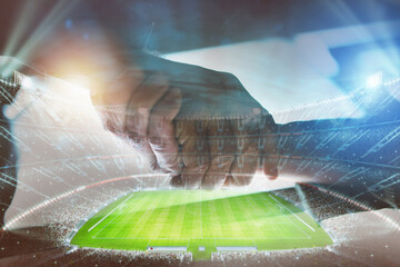 Agreement with an handshake of two soccer manager in a football stadium