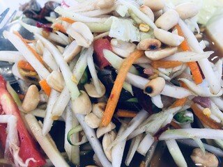 Papaya salad, thai food, closeup of photo