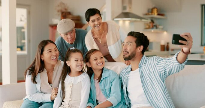 Big family, children and selfie on couch in home living room with grandparents, mom and dad with smile together. Men, women and kids in house with love, care or bonding for post on social network app