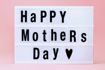 Happy Mother's Day led light box sign board on pink background.