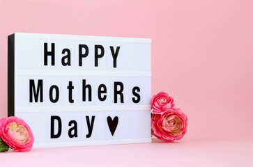 Happy Mother's Day led light box sign board on pink background.