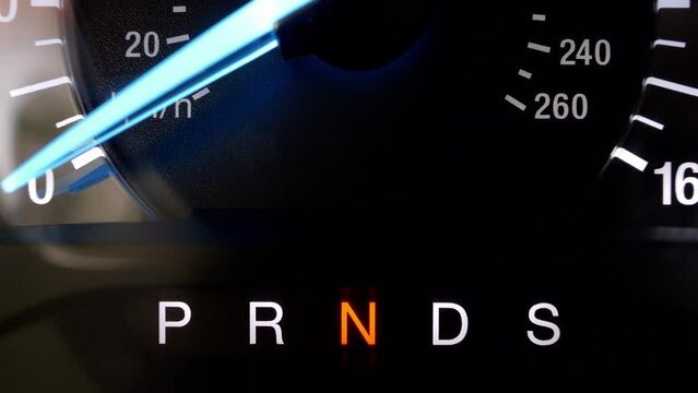 Car dashboard close up. Shifting automatic transmission from sport mode to parking