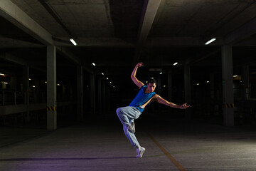 Active man and street dancer doing a cool performance