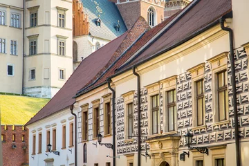 Gartenposter Facade of historic buildings in the old town of Krakow, Poland © Photofex