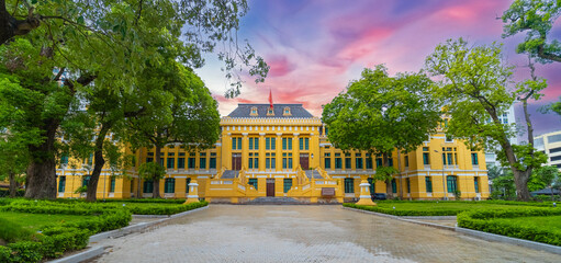 Old Apartment house block in Hanoi Old Quarters Vietnam narrow tall houses with plants on exterior...
