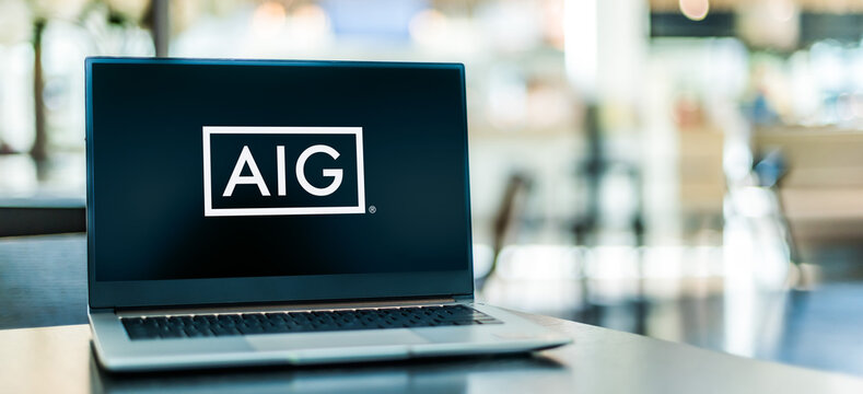 Laptop computer displaying logo of AIG