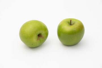 Green apple on white background. Vegetable is heathly food for diet can make a smoothies and salad.