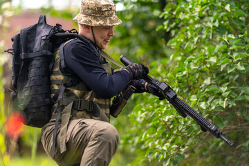 Man reloading his rifle