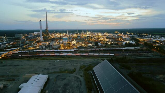 Aerial drone footage of chemiepark in Marl Germany in the dusk.