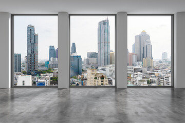 Obraz na płótnie Canvas Empty room Interior Skyscrapers View Bangkok. Downtown City Skyline Buildings from High Rise Window. Beautiful Expensive Real Estate overlooking. Day time. 3d rendering.