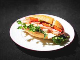 sandwich with ham and vegetables