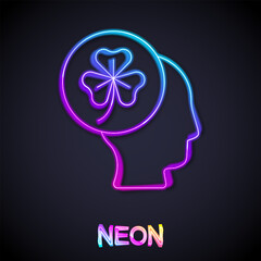 Glowing neon line Human head with clover trefoil leaf icon isolated on black background. Happy Saint Patricks day. National Irish holiday. Vector