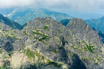 Koscielec (Koscielec) - Peak in the Polish Tatra Mountains. A popular destination for mountain trips during the holidays. - 624093872