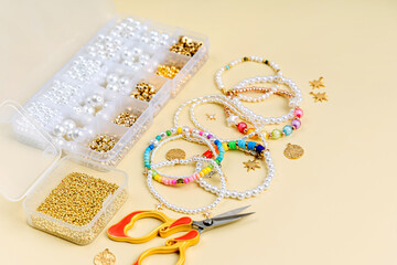 Set of for needlework and beading with tools for making jewelry. Handmade pearls beaded jewelry and...