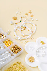Handmade pearls beaded jewelry. Necklaces and bracelets made from  beads and pearls. DIY bracelet beads.  Creativity, needlework and hobby.