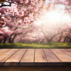 Naklejka na ściany i meble Sakura cherry tree blooms backgrounds with empty wooden table