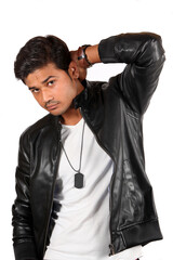 A handsome young Indian guy in a black leather jacket.