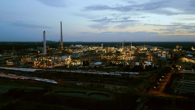 Aerial drone footage of chemiepark in Marl Germany in the dusk.
