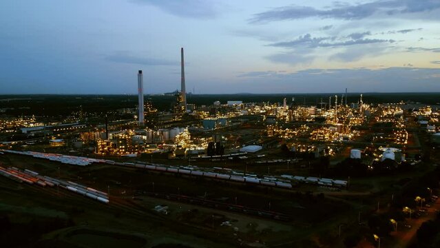 Aerial drone footage of chemiepark in Marl Germany in the dusk.