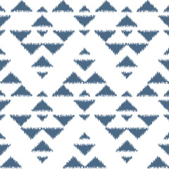 Seamless ikat pattern with blue elements on white background.