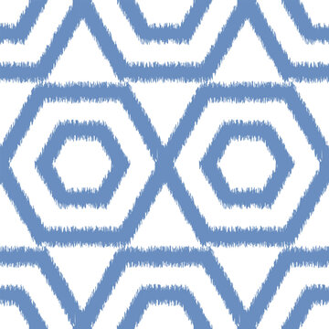 Seamless ikat pattern with blue elements on white background.