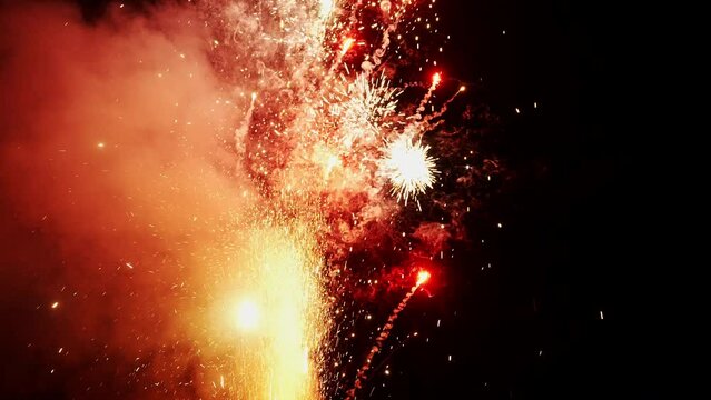 Witness the magic unfold in a close-up shot of fireworks. Each vibrant burst paints the night sky with a kaleidoscope of colors, illuminating the darkness with ephemeral beauty ignites the imagination