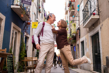 Obraz na płótnie Canvas Joyful Senior Couple Posing And Having Fun During Walk Outside