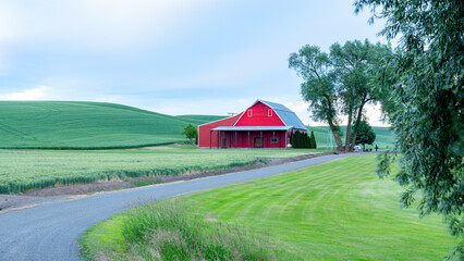 Red barn and gravel road in the Palouse farm country