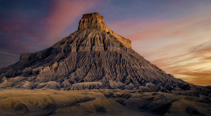 Sunrise at Factory Butte rock formation near Hanksville, Utah © Teri