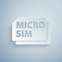 Paper cut Micro Sim Card icon isolated on grey background. Mobile and wireless communication technologies. Network chip electronic connection. Paper art style. Vector