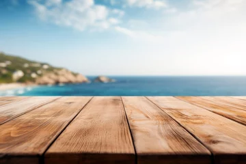 Poster de jardin Paysage Wooden table on the background of the sea, island and the blue sky. High quality photo