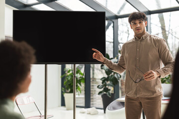 Arabic Businessman Giving Presentation Speech At Business Conference In Office