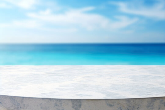 White marble stone table top on blur tropical beach background - can be used for display or montage your products. High quality photo