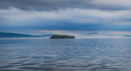 cloudy evening on Lake Champlain with Juniper Island and Dunder Rock in Burlington, Vermont
